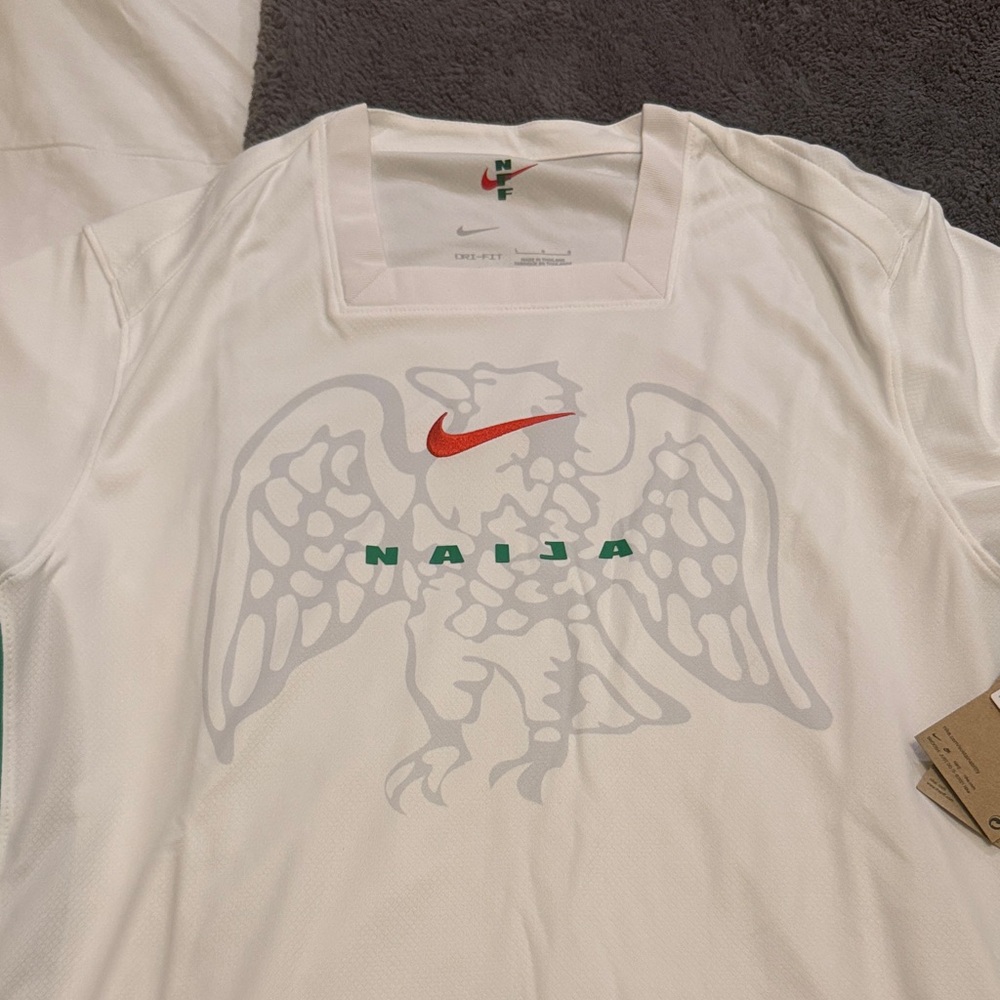 Nike Men’s White Naija Graphic Performance Jersey with Red Swoosh